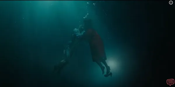 Two figures embrace underwater in an ethereal setting.