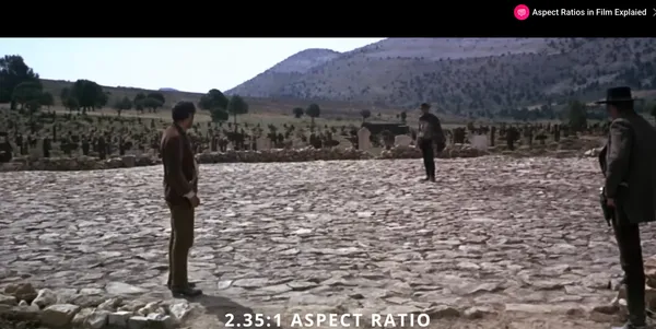 Three characters face off in a wide open area resembling a cemetery.