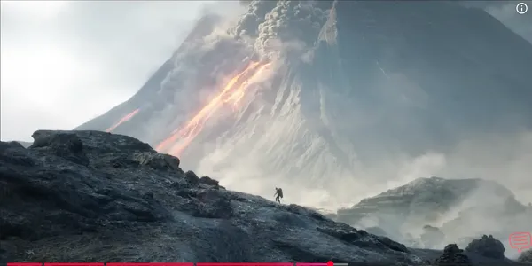 A person approaches a smoking and erupting volcano.