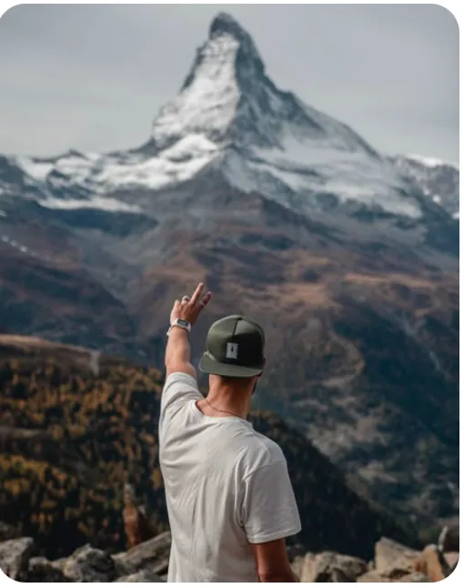 Person admiring a mountain view