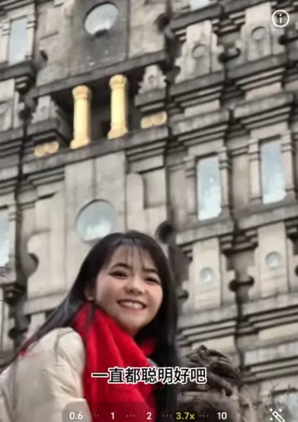 A person posing in front of historic architecture