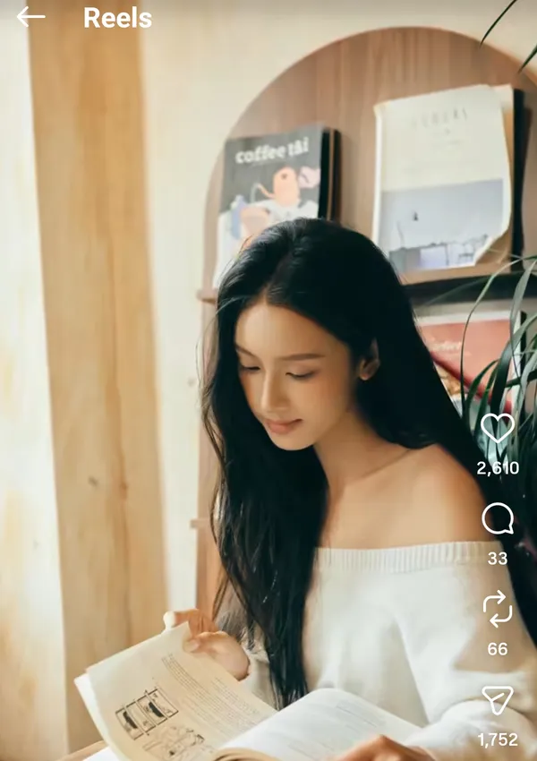 A person reading in a cozy setting.